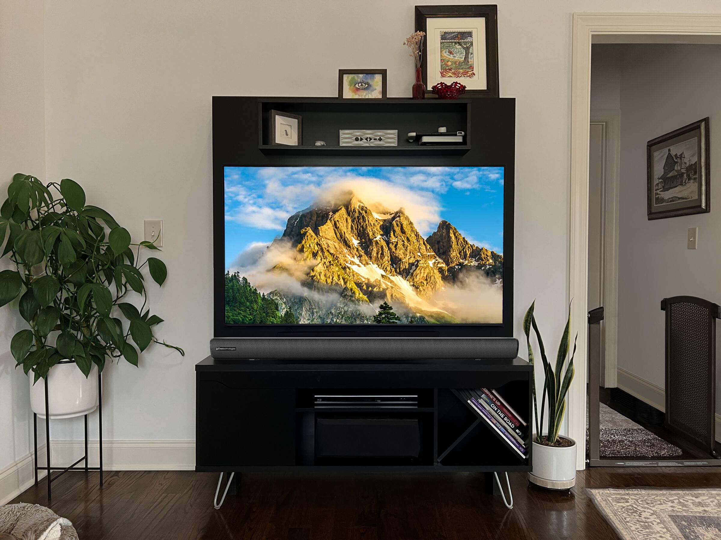 NXBAR 2.1 under a TV in a living room
